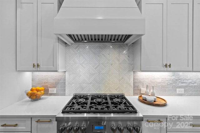 5638 Timber Ln, Charlotte, NC 28270 - kitchen with range hood, cooktop, light countertops, and backsplash
