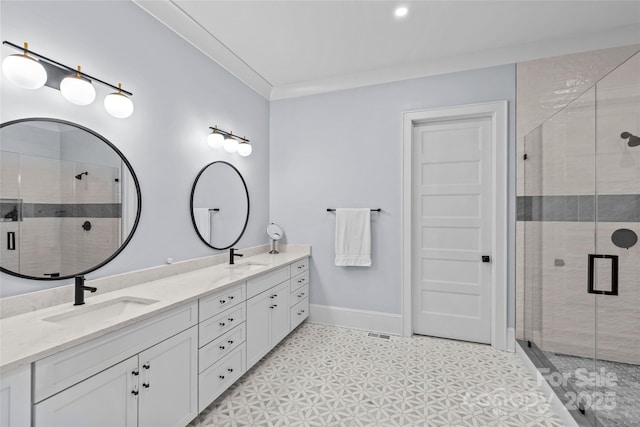 5638 Timber Ln, Charlotte, NC 28270 - bathroom featuring double vanity, a stall shower, baseboards, and ornamental molding