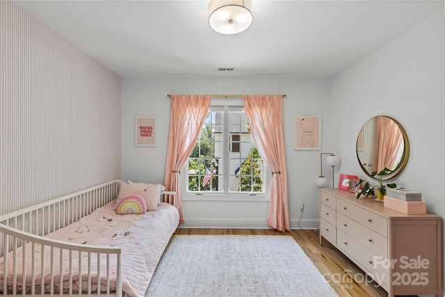 5638 Timber Ln, Charlotte, NC 28270 - bedroom with light wood finished floors and baseboards