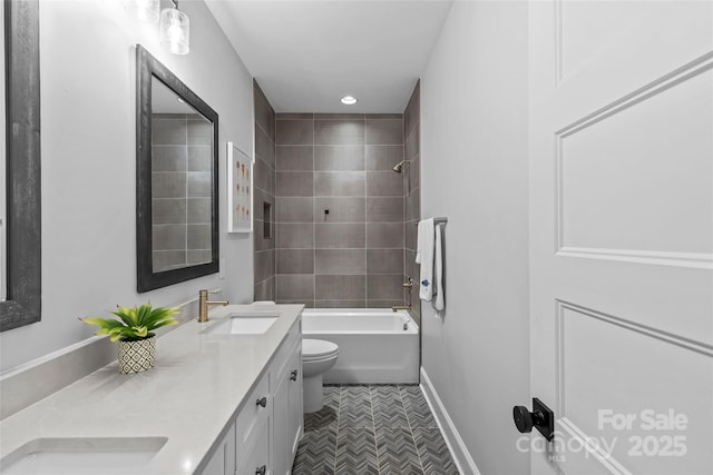 5638 Timber Ln, Charlotte, NC 28270 - bathroom with toilet, double vanity, shower / tub combination, recessed lighting, and baseboards