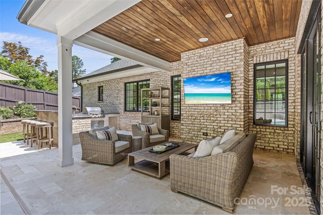 5638 Timber Ln, Charlotte, NC 28270 - view of patio featuring an outdoor living space and a bar