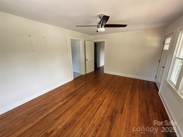 322 Buffalo St, Shelby, NC 28150 - spare room with dark wood-style flooring and ceiling fan