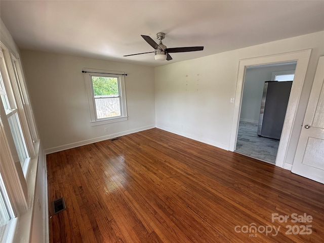 322 Buffalo St, Shelby, NC 28150 - unfurnished room featuring wood-type flooring and a ceiling fan