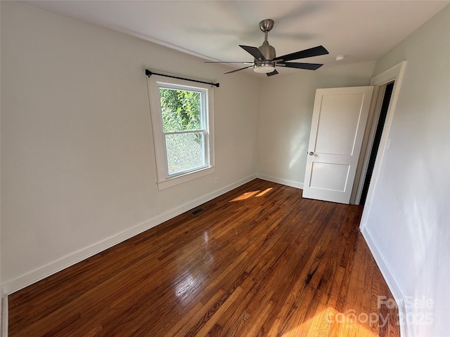 322 Buffalo St, Shelby, NC 28150 - unfurnished room featuring dark wood-style floors, a ceiling fan, and a smoke detector