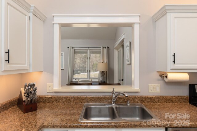 100 Donna Dr, Franklin, NC 28734 - kitchen featuring a sink, dark countertops, and white cabinets