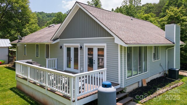 100 Donna Dr, Franklin, NC 28734 - rear view of house featuring french doors, a shingled roof, a chimney, cooling unit, and a yard