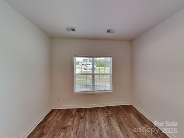 2612 Cold Springs Rd, Concord, NC 28025 - spare room featuring dark wood finished floors and baseboards