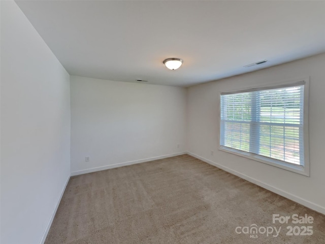 2612 Cold Springs Rd, Concord, NC 28025 - empty room with baseboards and light carpet