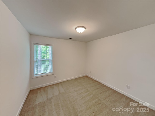 2612 Cold Springs Rd, Concord, NC 28025 - unfurnished room featuring light carpet and baseboards