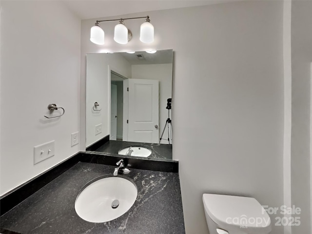 2612 Cold Springs Rd, Concord, NC 28025 - half bathroom featuring toilet and vanity