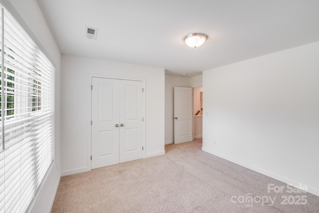 2612 Cold Springs Rd, Concord, NC 28025 - unfurnished bedroom with carpet and a closet