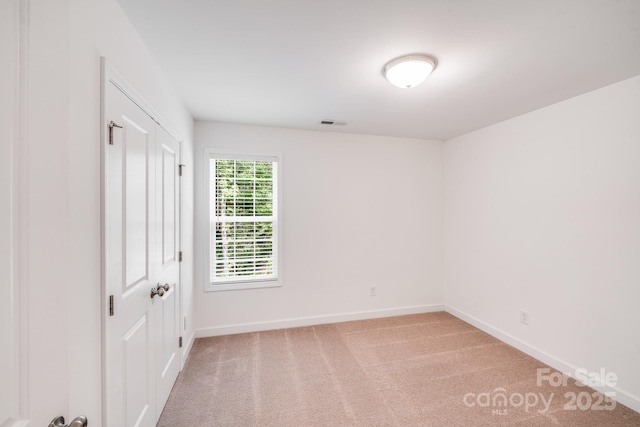 2612 Cold Springs Rd, Concord, NC 28025 - unfurnished bedroom featuring light carpet and a closet