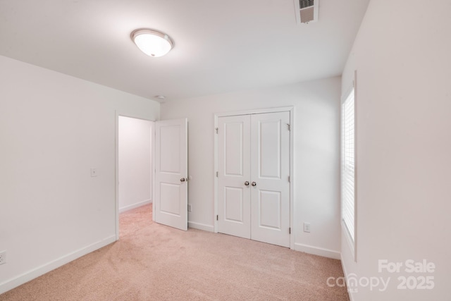 2612 Cold Springs Rd, Concord, NC 28025 - unfurnished bedroom with light carpet and a closet