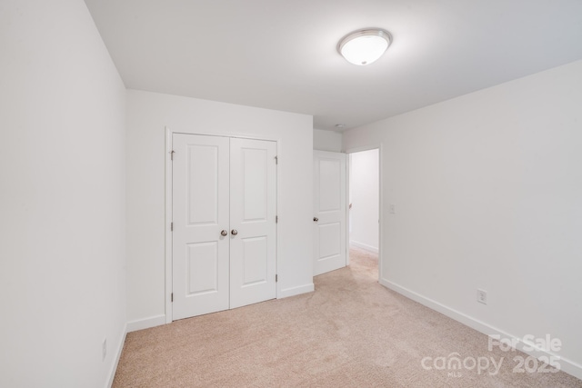 2612 Cold Springs Rd, Concord, NC 28025 - unfurnished bedroom with light carpet and a closet