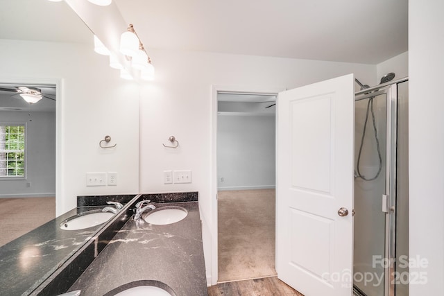 2612 Cold Springs Rd, Concord, NC 28025 - bathroom with double vanity, a stall shower, and a ceiling fan