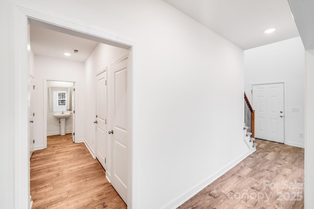 2612 Cold Springs Rd, Concord, NC 28025 - hall with light wood-style floors, stairs, and recessed lighting
