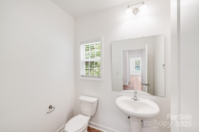 2612 Cold Springs Rd, Concord, NC 28025 - half bathroom featuring baseboards and toilet