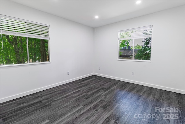 338 Orchard Trace Ln Unit 8, Charlotte, NC 28213 - spare room with dark wood-style flooring, recessed lighting, and baseboards