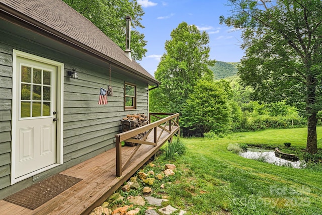 24 Cataloochee Ln, Waynesville, NC 28785 - view of green lawn featuring a deck