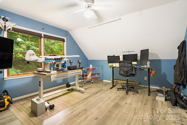 24 Cataloochee Ln, Waynesville, NC 28785 - home office with wood finished floors, lofted ceiling, a baseboard radiator, and a ceiling fan