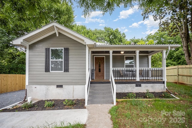 952 Salisbury St, Wadesboro, NC 28170 - view of front of home featuring crawl space, a porch, and a metal roof