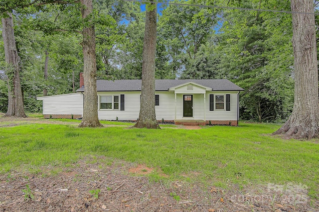 240 Swink Ave, Salisbury, NC 28147 - view of front facade with a front lawn, roof with shingles, and a chimney