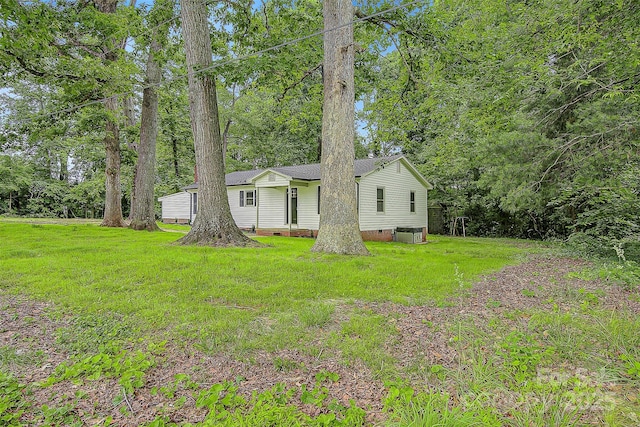 240 Swink Ave, Salisbury, NC 28147 - view of front of house with crawl space, a front lawn, cooling unit, and roof with shingles