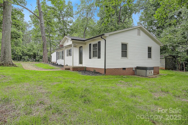 240 Swink Ave, Salisbury, NC 28147 - view of property exterior with crawl space, central air condition unit, and a lawn