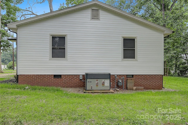 240 Swink Ave, Salisbury, NC 28147 - view of side of property with crawl space, central AC unit, and a lawn