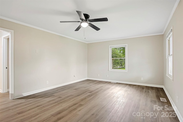240 Swink Ave, Salisbury, NC 28147 - unfurnished room featuring wood finished floors, crown molding, baseboards, and a ceiling fan