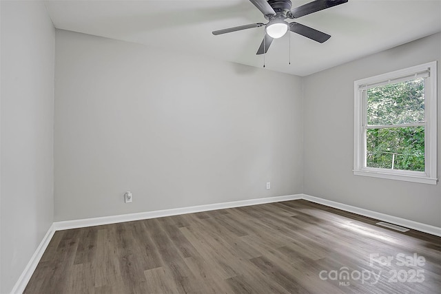 240 Swink Ave, Salisbury, NC 28147 - empty room with wood finished floors, baseboards, and ceiling fan
