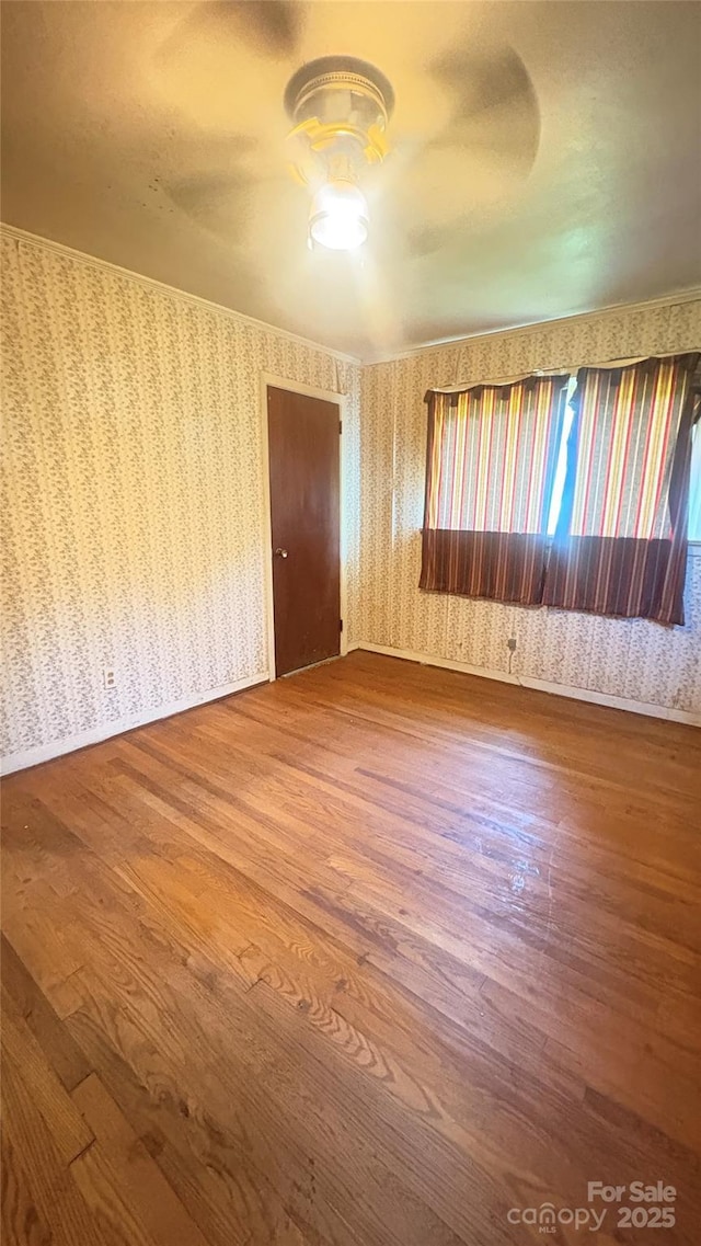 1073 Springdale Dr, Maiden, NC 28650 - unfurnished room with wallpapered walls and wood finished floors