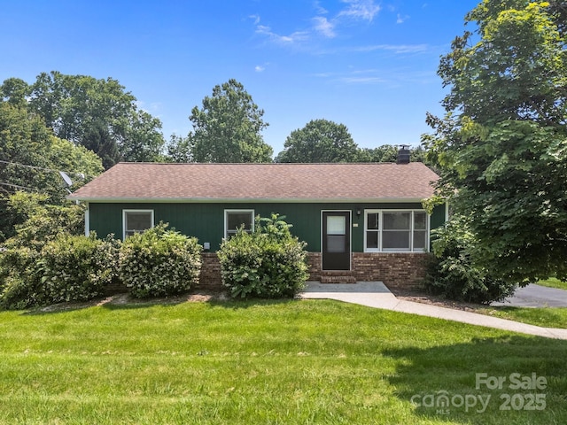 520 Forest St, Mars Hill, NC 28754 - ranch-style home featuring a front lawn, a chimney, brick siding, and a shingled roof