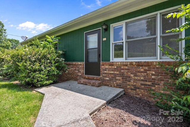 520 Forest St, Mars Hill, NC 28754 - property entrance with brick siding and a patio area