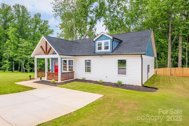 516 N Mulberry St, Cherryville, NC 28021 - view of front facade featuring covered porch and a shingled roof