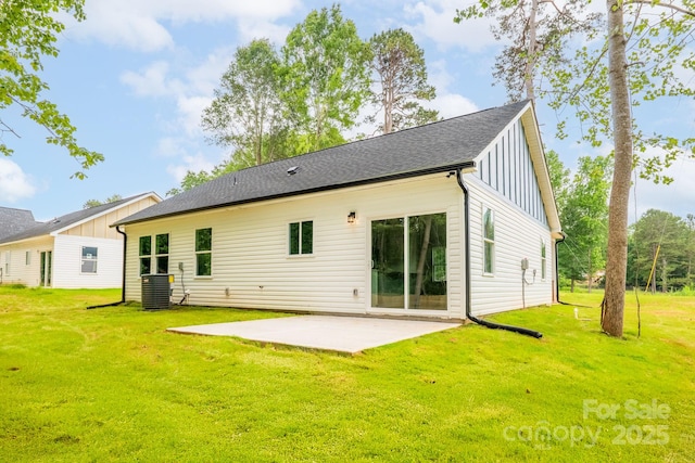 516 N Mulberry St, Cherryville, NC 28021 - back of house featuring board and batten siding, a patio, and a lawn