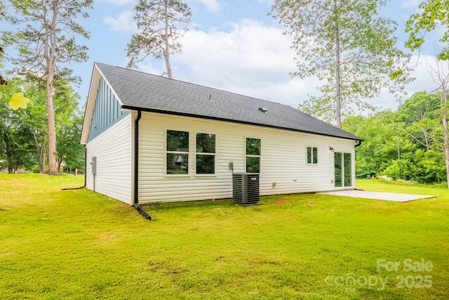 516 N Mulberry St, Cherryville, NC 28021 - rear view of property with a yard, a patio area, a shingled roof, and board and batten siding