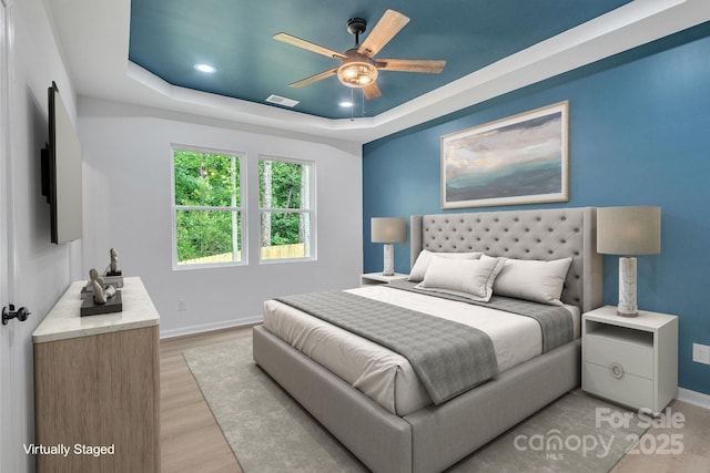 516 N Mulberry St, Cherryville, NC 28021 - bedroom with a raised ceiling, recessed lighting, light wood-type flooring, and ceiling fan