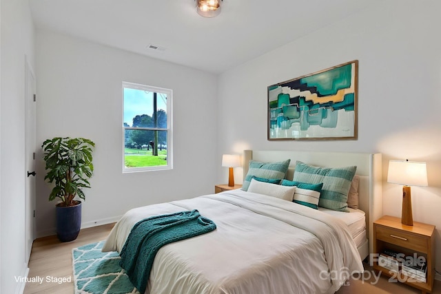 516 N Mulberry St, Cherryville, NC 28021 - bedroom featuring wood finished floors and baseboards