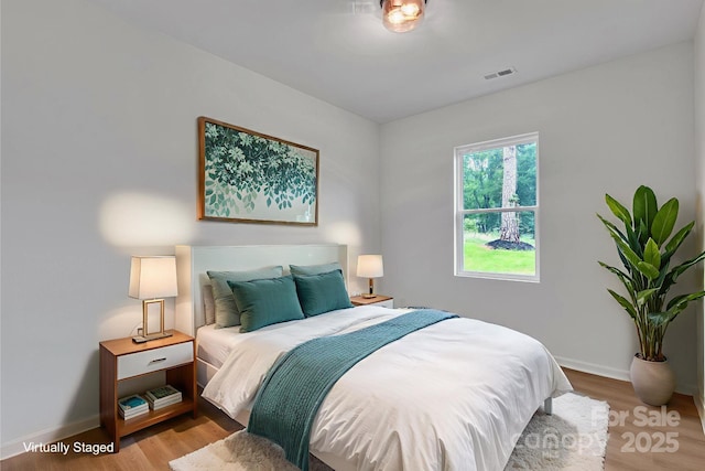 516 N Mulberry St, Cherryville, NC 28021 - bedroom featuring light wood-style flooring and baseboards