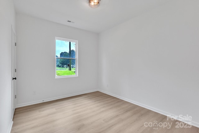 516 N Mulberry St, Cherryville, NC 28021 - unfurnished room with light wood finished floors