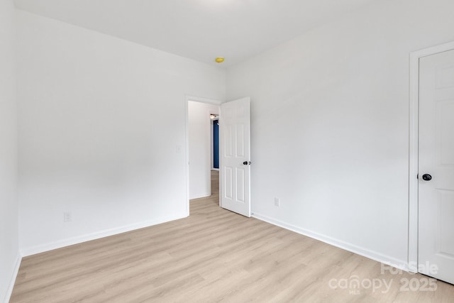 516 N Mulberry St, Cherryville, NC 28021 - empty room with light wood finished floors and baseboards