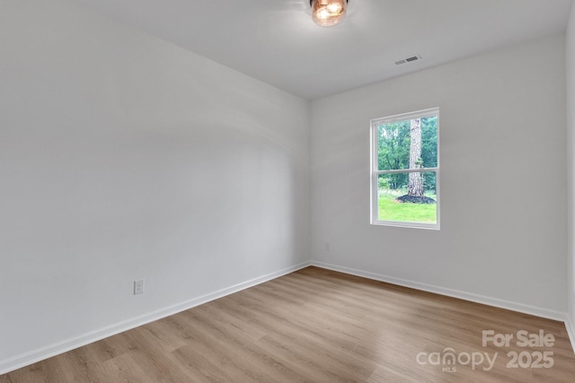 516 N Mulberry St, Cherryville, NC 28021 - unfurnished room featuring wood finished floors and baseboards