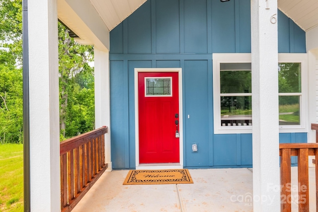 516 N Mulberry St, Cherryville, NC 28021 - doorway to property featuring board and batten siding