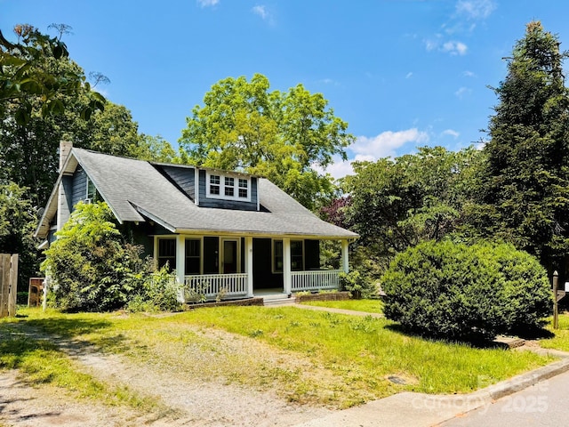 602 Brookshire St, Asheville, NC 28803 - bungalow-style house with a porch, a chimney, and a shingled roof
