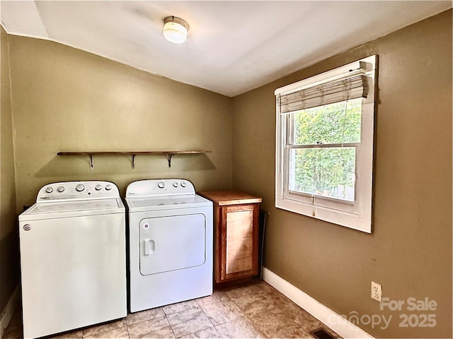 602 Brookshire St, Asheville, NC 28803 - washroom with independent washer and dryer, baseboards, and cabinet space