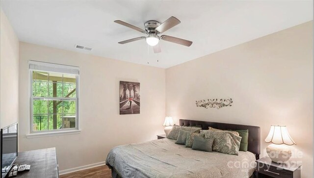 2009 Trindle Vine Ln, Waxhaw, NC 28173 - bedroom featuring wood finished floors, baseboards, and ceiling fan