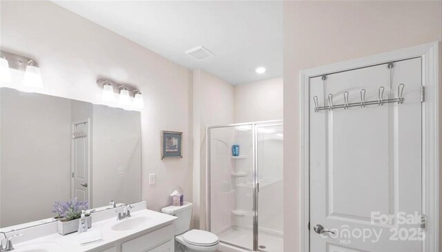 2009 Trindle Vine Ln, Waxhaw, NC 28173 - full bath featuring a shower stall, double vanity, and toilet
