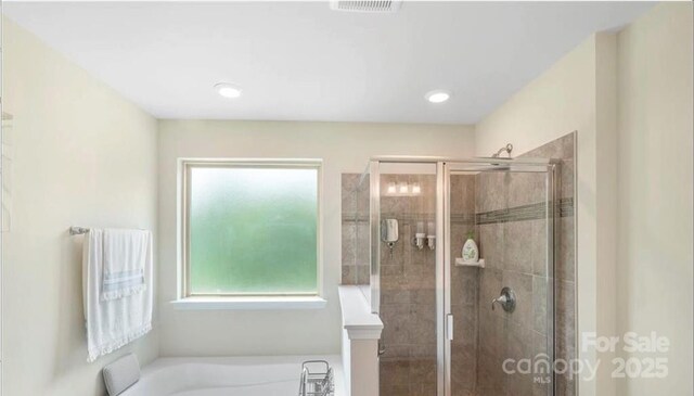 2009 Trindle Vine Ln, Waxhaw, NC 28173 - full bath featuring a stall shower and a garden tub