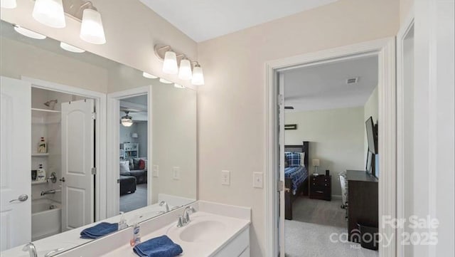 2009 Trindle Vine Ln, Waxhaw, NC 28173 - full bathroom with ensuite bath, vanity,  shower combination, and ceiling fan